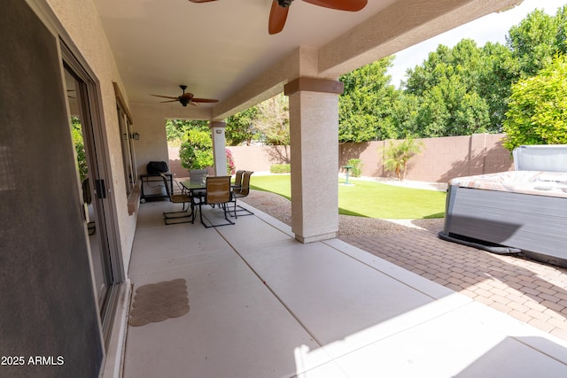 view of patio / terrace featuring a ceiling fan, outdoor dining area, and a fenced backyard