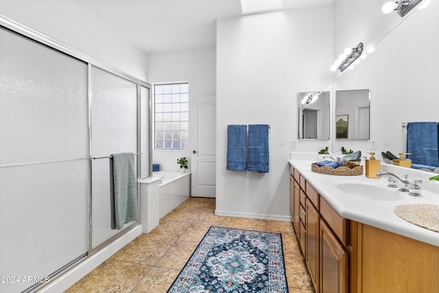 bathroom featuring tile patterned floors, vanity, and plus walk in shower