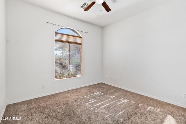 carpeted empty room with ceiling fan