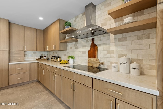 kitchen with open shelves, light countertops, black electric cooktop, wall chimney exhaust hood, and backsplash