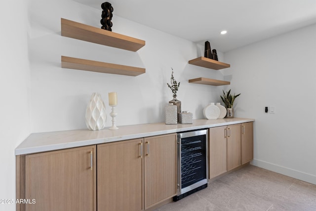 bar with recessed lighting, baseboards, a bar, and wine cooler