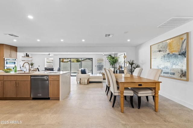 dining area with visible vents, recessed lighting, and ceiling fan