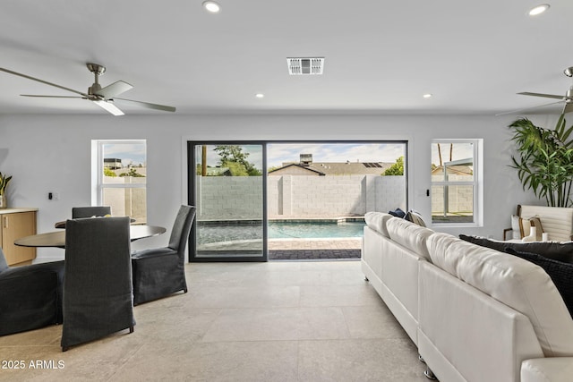 living room with visible vents, recessed lighting, plenty of natural light, and ceiling fan
