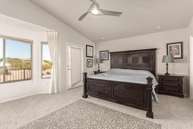 carpeted bedroom with ceiling fan and lofted ceiling