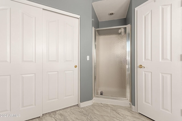 bathroom with an enclosed shower