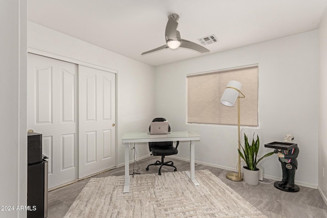 office area with ceiling fan