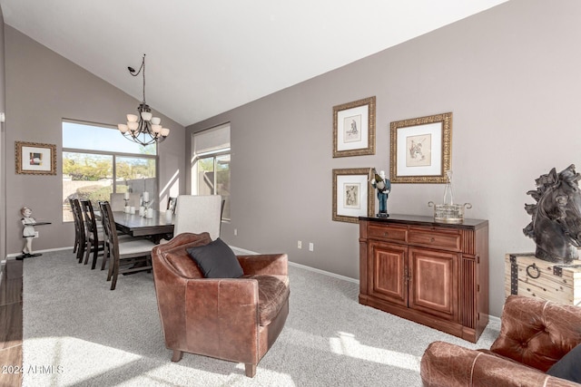 interior space featuring high vaulted ceiling and an inviting chandelier