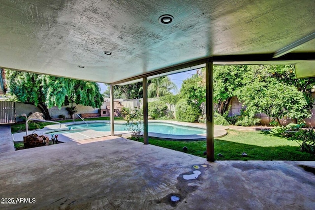 view of pool featuring a yard, a patio area, a fenced backyard, and a fenced in pool