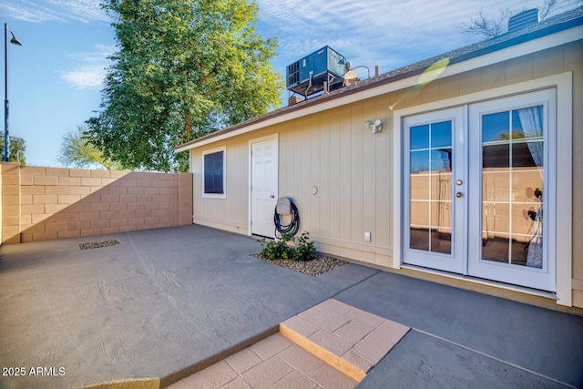 view of patio featuring central air condition unit and french doors