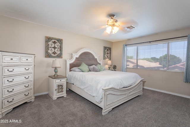 carpeted bedroom featuring visible vents, baseboards, and ceiling fan