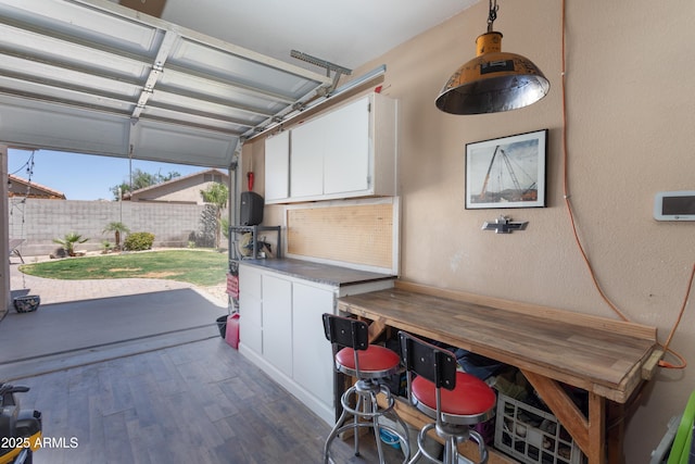 interior space with fence