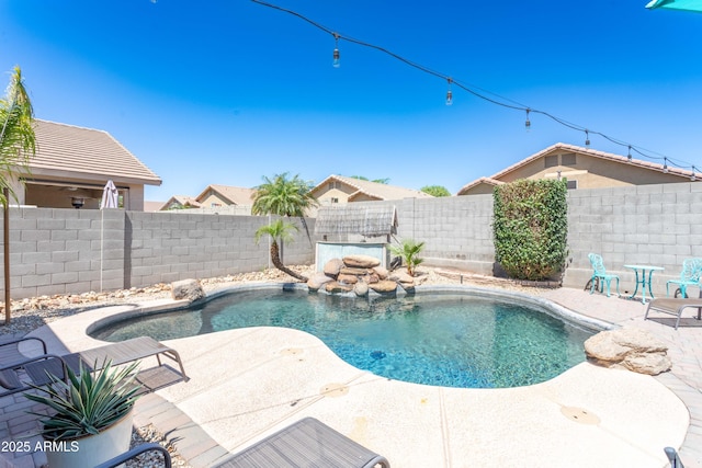 view of swimming pool with a fenced in pool, a patio, and a fenced backyard