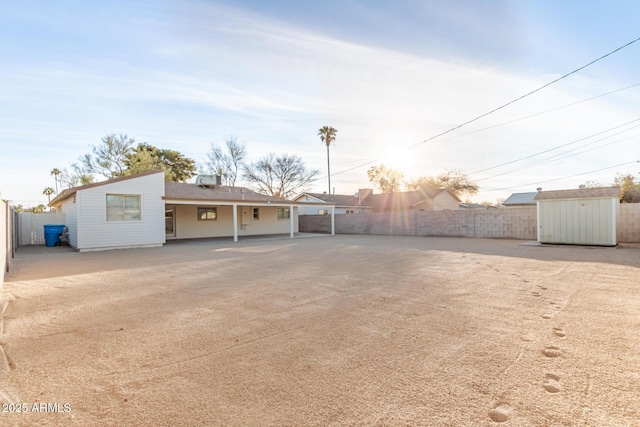 exterior space with a storage shed