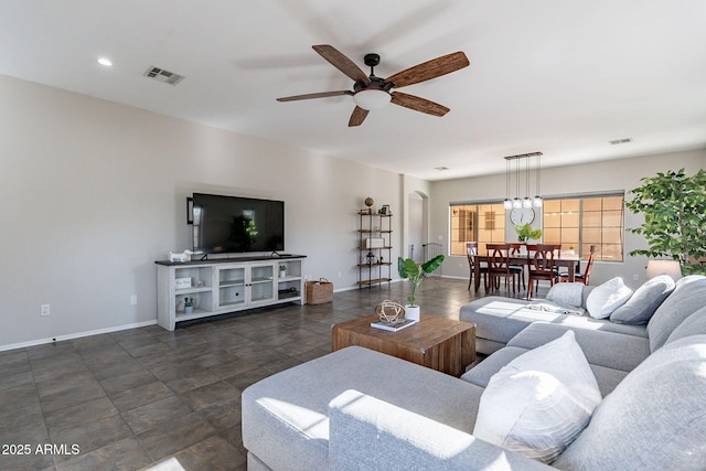 living room featuring ceiling fan