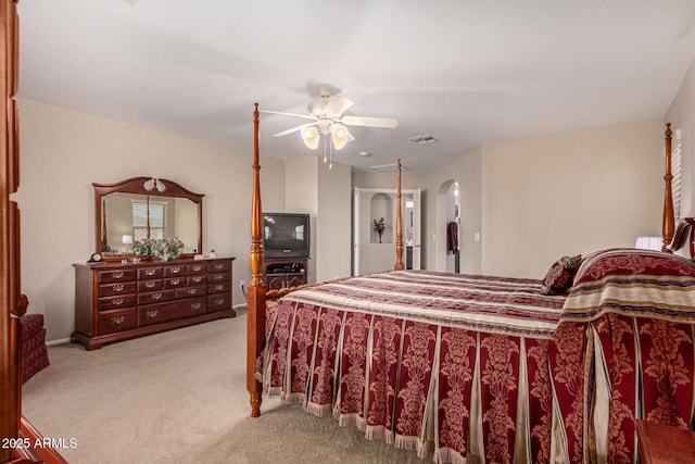 bedroom featuring light colored carpet and ceiling fan