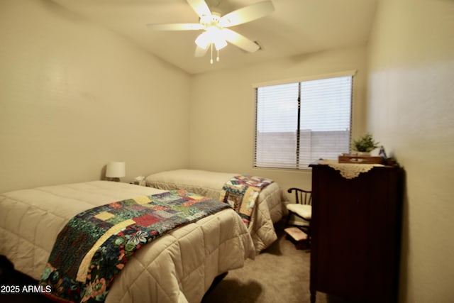 bedroom with ceiling fan and carpet