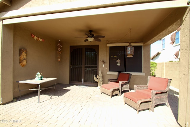 view of patio with ceiling fan