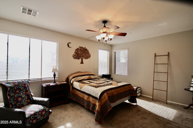 bedroom featuring ceiling fan and carpet floors