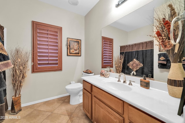 3214 N 138th Dr, Avondale, AZ 85392 - bathroom with vanity, toilet, tile patterned flooring, baseboards, and a shower with curtain