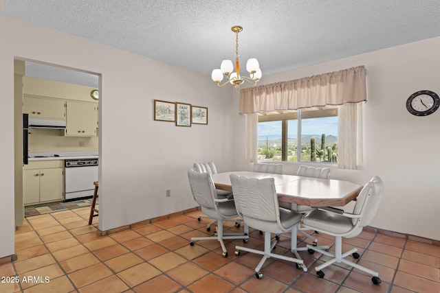 637 Chaparral Rd, Wickenburg, AZ 85390 - dining area featuring an inviting chandelier, baseboards, light tile patterned floors, and a textured ceiling