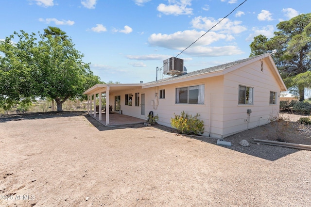 637 Chaparral Rd, Wickenburg, AZ 85390 - rear view of property featuring a patio area and central AC