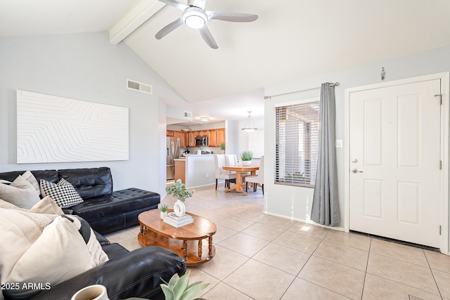 tiled living room featuring beam ceiling, high vaulted ceiling, and ceiling fan