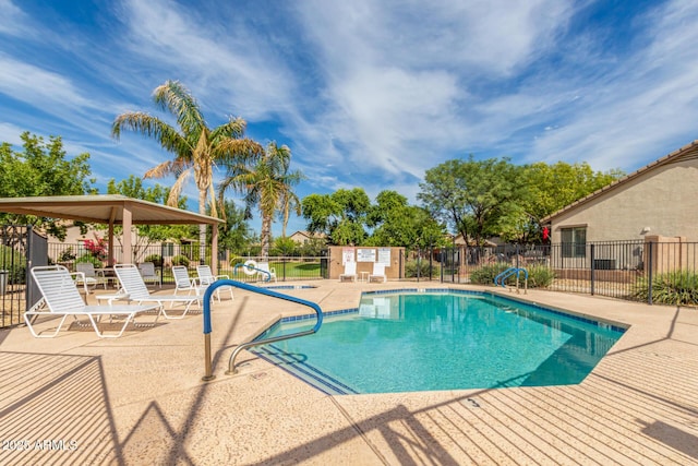 view of swimming pool featuring a gazebo and a patio area