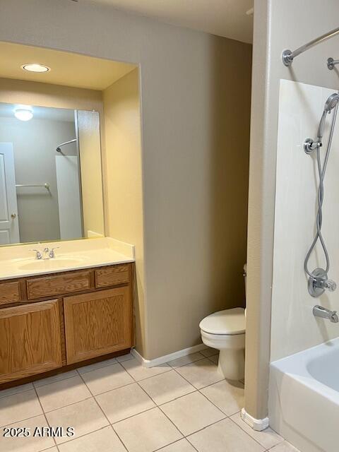 6376 W Adobe Dr, Glendale, AZ 85308 - bathroom with vanity, tile patterned flooring, toilet, shower / bath combination, and baseboards