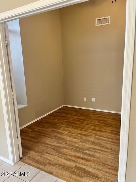 6376 W Adobe Dr, Glendale, AZ 85308 - spare room featuring light wood-type flooring and baseboards