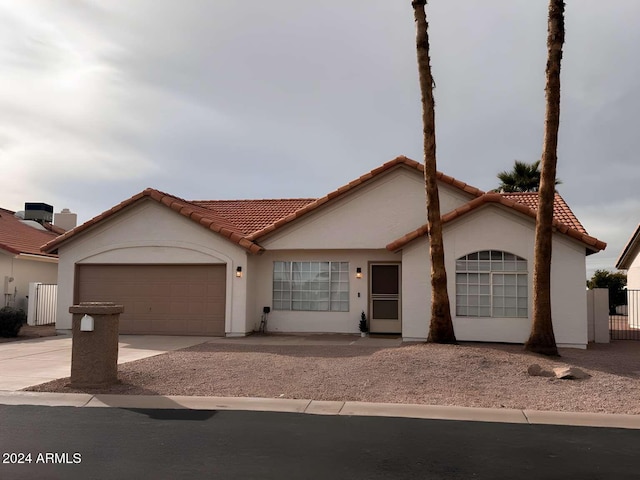 view of front of home with a garage