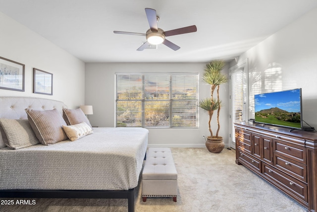 11400 E Helm Dr, Scottsdale, AZ 85255 - bedroom with light carpet, baseboards, and a ceiling fan