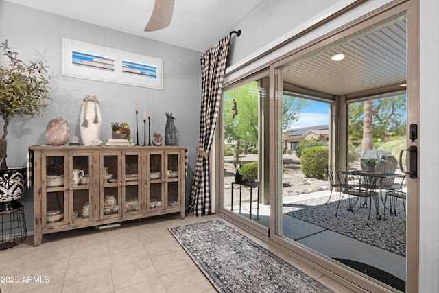 15971 W Indigo Ln, Surprise, AZ 85374 - doorway to outside with tile patterned flooring and ceiling fan