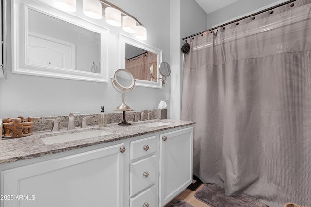 15971 W Indigo Ln, Surprise, AZ 85374 - bathroom with double vanity and curtained shower
