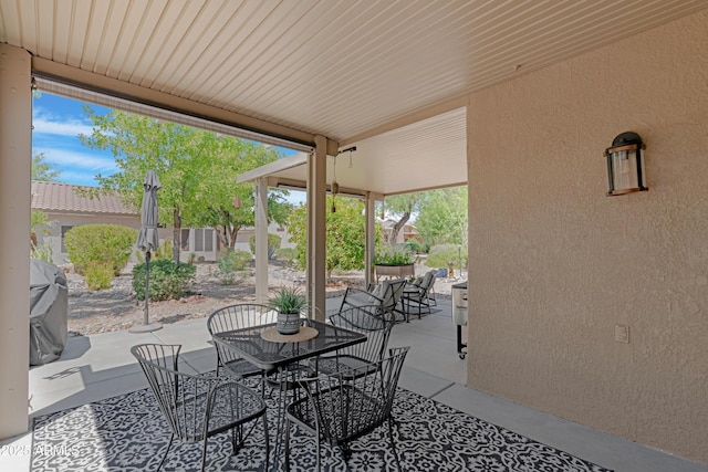 15971 W Indigo Ln, Surprise, AZ 85374 - view of patio featuring outdoor dining space and a grill