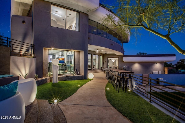 3282 E Palo Verde Dr, Paradise Valley, AZ 85253 - view of front of property with ceiling fan, outdoor lounge area, a bar, and a patio
