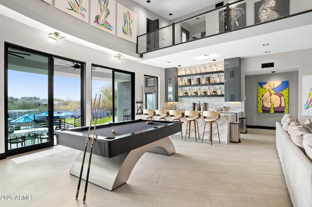 3282 E Palo Verde Dr, Paradise Valley, AZ 85253 - playroom featuring pool table, a high ceiling, and bar area