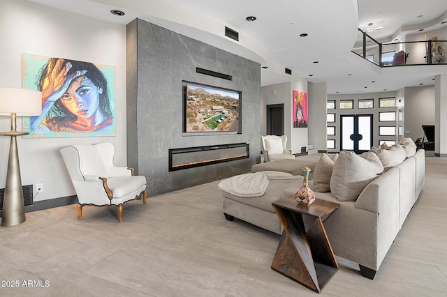 3282 E Palo Verde Dr, Paradise Valley, AZ 85253 - living room with a tiled fireplace and a high ceiling