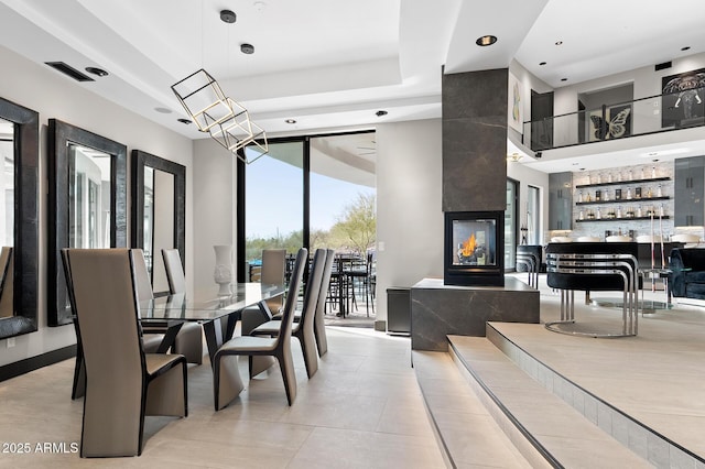 3282 E Palo Verde Dr, Paradise Valley, AZ 85253 - dining space with a multi sided fireplace