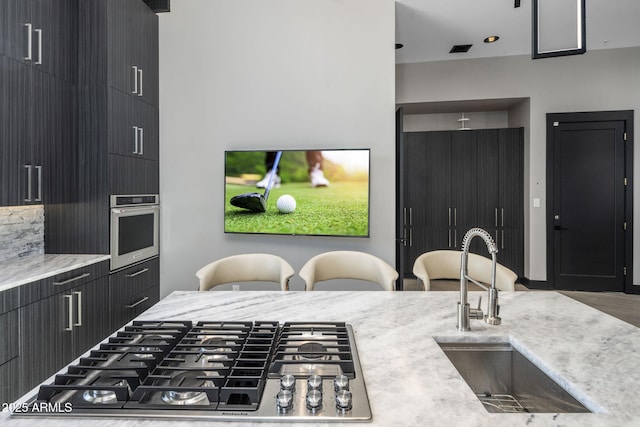 3282 E Palo Verde Dr, Paradise Valley, AZ 85253 - kitchen featuring gas stovetop, sink, and oven