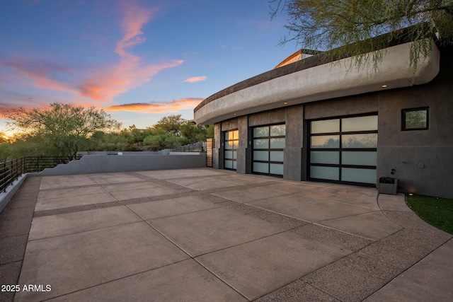 3282 E Palo Verde Dr, Paradise Valley, AZ 85253 - property exterior at dusk with a garage
