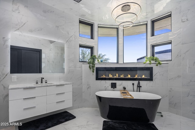 3282 E Palo Verde Dr, Paradise Valley, AZ 85253 - bathroom featuring vanity, tile walls, and a bathing tub