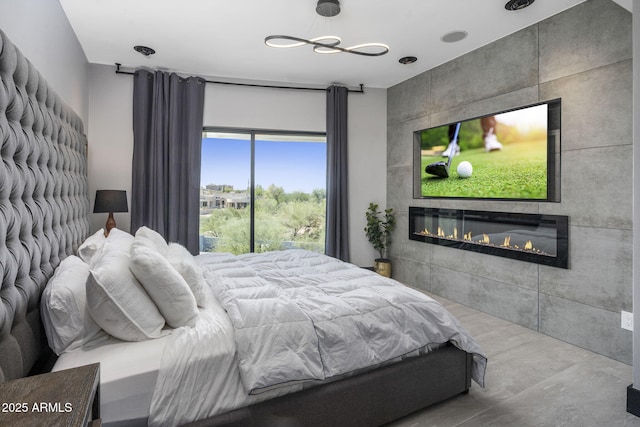 3282 E Palo Verde Dr, Paradise Valley, AZ 85253 - bedroom featuring a tile fireplace