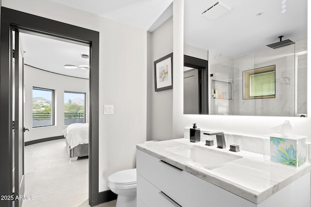 3282 E Palo Verde Dr, Paradise Valley, AZ 85253 - bathroom with toilet, vanity, and a tile shower