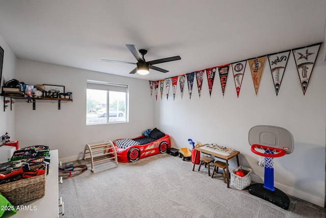 game room with ceiling fan, carpet, and baseboards