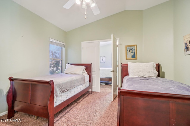 carpeted bedroom with ceiling fan and lofted ceiling