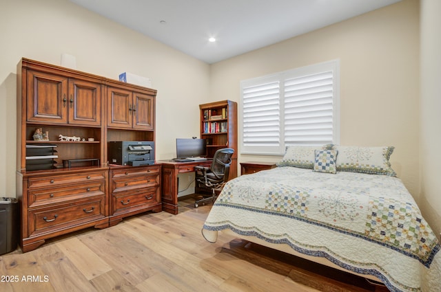 bedroom featuring light hardwood / wood-style floors