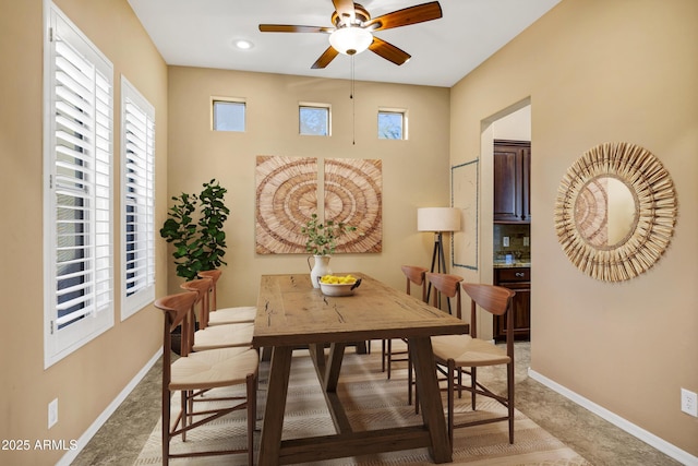 dining area featuring ceiling fan, recessed lighting, and baseboards