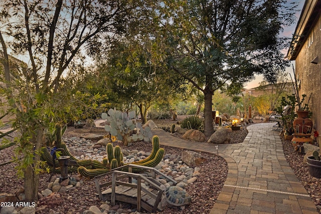 view of patio terrace at dusk