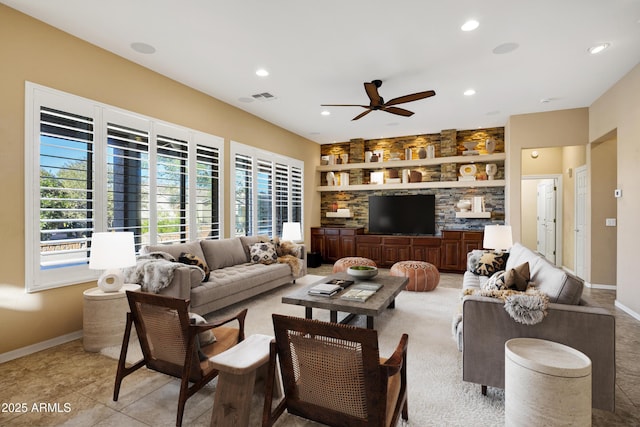 living room with built in features, recessed lighting, visible vents, and baseboards