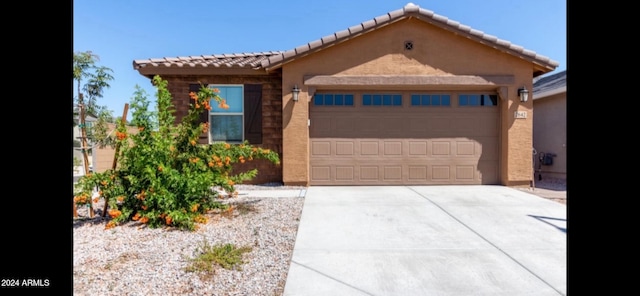 view of front of home featuring a garage